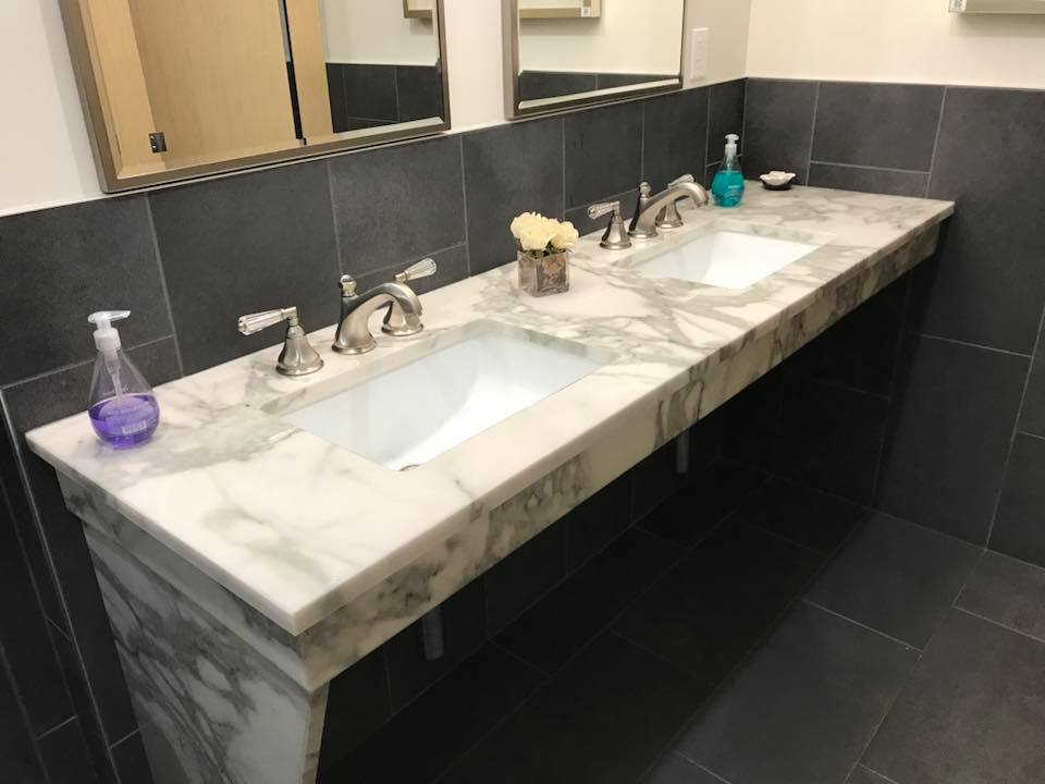 Commercial Bathroom Double Sinks with undermount and cultured marble tops. Easy care, no leaks, no mold or mildew. Grout Free Vanities and Bathrooms from AMI in Canton, OH