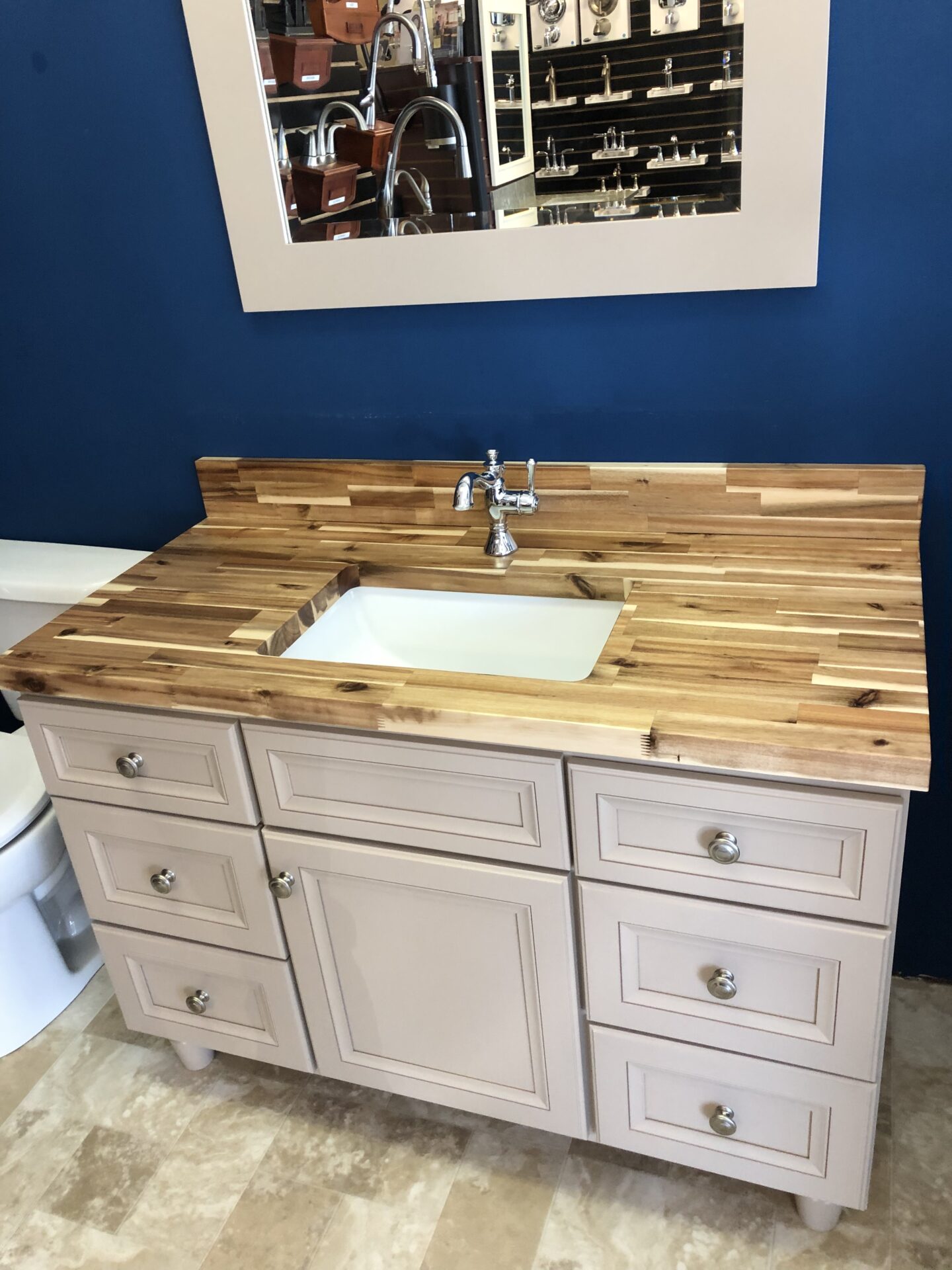 Madera Natural sink with wooden cabinets