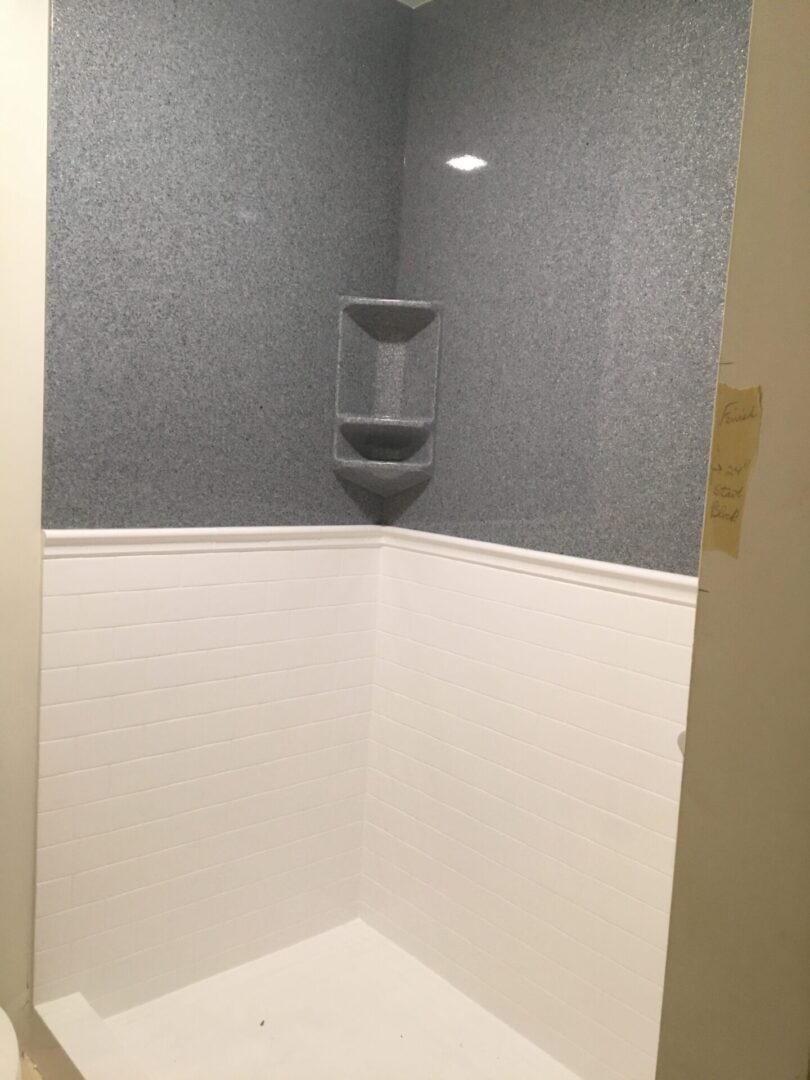 A White and Grey Bathroom Walled Surface